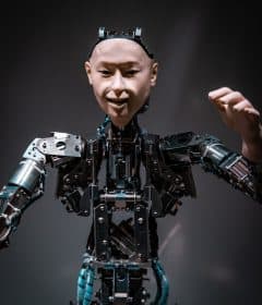 man in black and gray suit action figure
