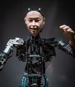 man in black and gray suit action figure